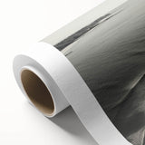 Sleek rolled canvas artwork featuring a serene lighthouse landscape design, showcasing vibrant colors and intricate details, ideal for coastal-themed decor.