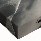 Close-up of a stretched canvas wall art featuring a serene lighthouse landscape design, showcasing vibrant colors and intricate details, perfect for coastal decor enthusiasts.