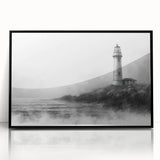 Framed acrylic wall art showcasing a vibrant lighthouse design against a serene landscape, with a sleek black frame enhancing its modern aesthetic. Perfect for coastal-themed decor, this piece adds warmth and inspiration to any room.