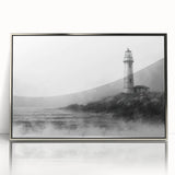 Framed wall art collection showcasing a serene landscape with a lighthouse, featuring a sleek silver frame and clear acrylic front, perfect for coastal decor.