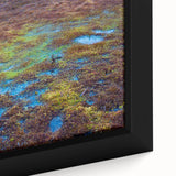 Framed canvas wall art showcasing a vibrant marsh landscape with lush greenery and reflections in water, perfect for nature-themed home decor.