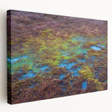 Stretched canvas wall art depicting a serene marsh landscape with vibrant greens and blues, showcasing lush vegetation and tranquil water reflections, ideal for nature lovers and home decor.