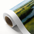 Rolled canvas artwork showcasing a serene marsh landscape with lush greenery and tranquil water reflections, perfect for nature-inspired home decor.