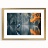 Framed landscape wall art featuring a serene marsh swamp design, highlighted by a gold frame and mat, ideal for enhancing home decor.