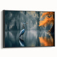 Framed canvas wall art depicting a serene marsh landscape with lush greenery and tranquil water, presented in a sleek black frame, ideal for home decor.