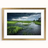 Framed wall art collection showcasing a serene marsh landscape with lush greenery and gentle water reflections, accented by a gold frame and mat, perfect for home decor.