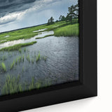 Framed canvas wall art depicting a serene marsh landscape, showcasing vibrant greens and blues with intricate details, ideal for home decor or nature enthusiasts.