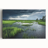 Stretched canvas wall art depicting a serene marsh landscape with lush greenery and calm waters, perfect for nature-themed decor in home or office settings.