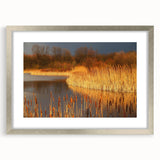 Framed wall art collection showcasing a serene marsh landscape with vibrant greens and blues, featuring a sleek silver frame and white matting for an elegant presentation. Perfect for enhancing home décor with nature-inspired themes.