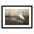 Framed wall art depicting a serene marsh landscape with lush greenery and reflective water, featuring a sleek black frame and matting, ideal for home decor.