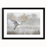 Framed wall art showcasing a serene marsh landscape design, featuring lush greenery and a tranquil water setting, with a sleek black frame and mat for a modern aesthetic.