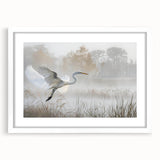 Framed wall art featuring a serene marsh landscape with vibrant greens and blues, set in a white mat. Perfect for enhancing home decor with nature-inspired aesthetics.