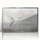 Framed wall art depicting a serene marsh landscape with vibrant greenery and tranquil water, featuring a sleek silver frame that enhances the natural beauty of the scene. Ideal for nature lovers and home decor enthusiasts.