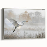 Framed canvas wall art depicting a serene marsh landscape with lush greenery and soft, muted colors; features a silver frame enhancing the natural scene's tranquility.