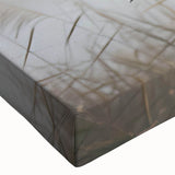 Close-up view of a vibrant stretched canvas showcasing a serene marsh landscape with lush greenery and soft reflections in the water, ideal for nature-themed decor.