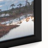 Close-up of a framed canvas wall art piece depicting a serene marsh landscape with lush greenery, vibrant colors, and intricate details, ideal for nature lovers.