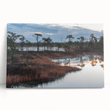 Vibrant stretched canvas artwork depicting a serene marsh landscape with lush greenery and reflective water, perfect for nature-themed decor and calming atmospheres.