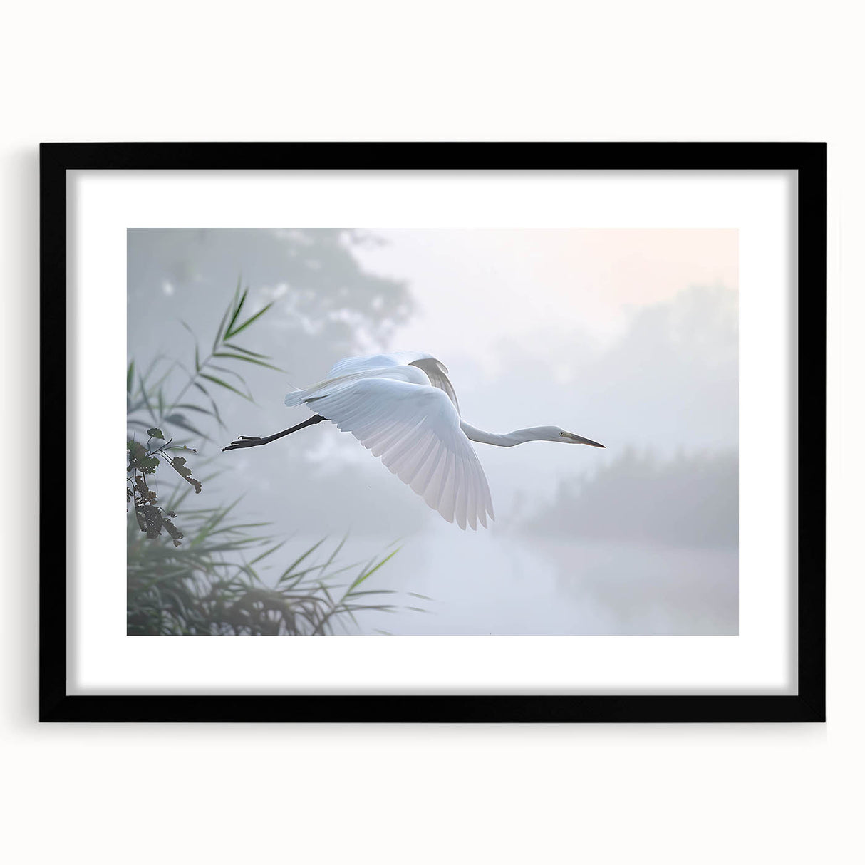 Framed wall art design showcasing a serene marsh landscape with vibrant green vegetation and calm waters, set in a sleek black frame with a mat. Ideal for nature lovers.