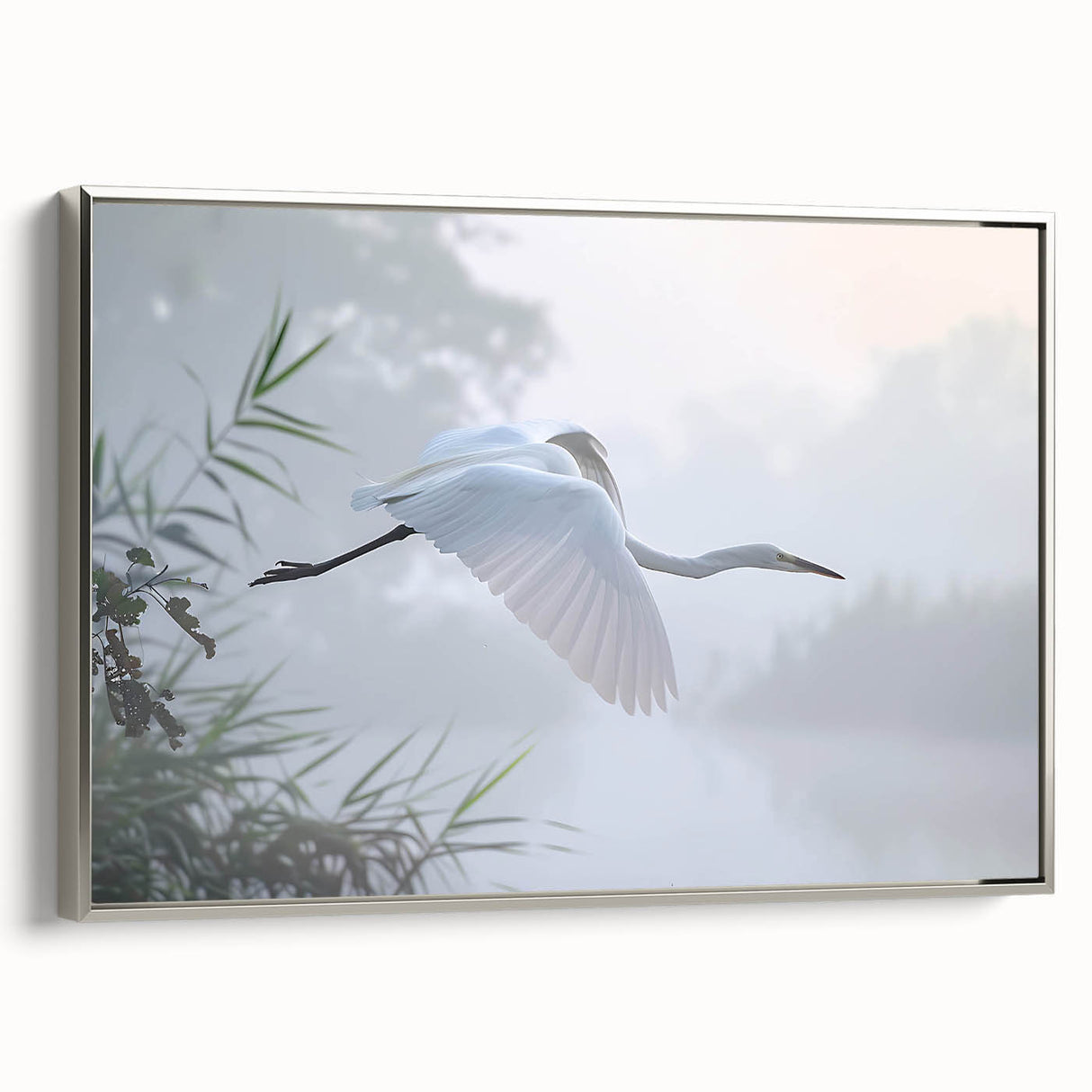 Framed canvas wall art depicting a serene marsh landscape with lush greenery and calm water, featuring a sleek silver frame that enhances the natural beauty of the scene. Perfect for home decor and nature enthusiasts.
