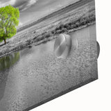 Close-up of a vibrant acrylic glass wall art piece depicting a serene marsh landscape, showcasing rich greens and blues with intricate details of swamp flora, perfect for nature enthusiasts.