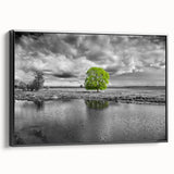 Framed canvas wall art showcasing a serene marsh landscape in vibrant greens and blues, perfect for nature enthusiasts and home decor accents. The artwork features a black frame, highlighting the tranquil swamp scene, ideal for enhancing any living space.