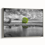 Framed canvas wall art showcasing a serene marsh landscape with lush greenery and reflective water, elegantly designed with a silver frame, perfect for home decor.