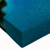 Close-up of a vibrant stretched canvas wall art piece showcasing a lush marsh landscape, featuring rich greens and earthy tones that capture the serene beauty of a swamp setting. Ideal for nature lovers and home decor enthusiasts seeking to enhance their space with tranquil, nature-inspired artwork.