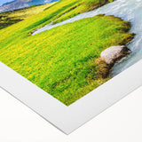 Vibrant rolled canvas artwork depicting a serene marsh landscape with lush greenery and tranquil water, ideal for nature-themed decor, packaged securely for delivery.