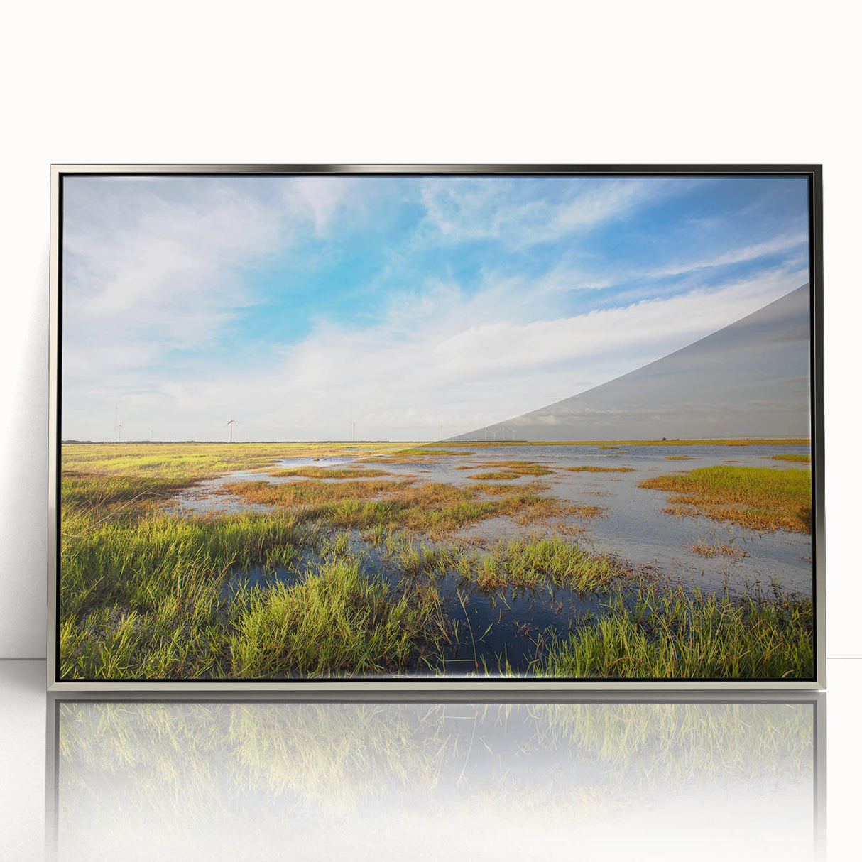 Framed acrylic wall art showcasing a serene marshland scene with vibrant greenery and reflective water, designed to enhance home decor with a modern touch. Ideal for nature lovers and contemporary art enthusiasts.
