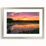 Framed wall art collection showcasing a serene marsh landscape with muted green and silver accents, elegantly displayed in a silver frame with a mat. Ideal for nature enthusiasts and home decor lovers.