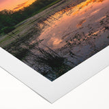 Vibrant rolled canvas wall art showcasing a serene marsh landscape, featuring lush greenery and tranquil water reflections, perfect for nature-inspired decor in any space.