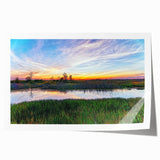 Lush marsh landscape wall art print showcasing vibrant greens and blues, featuring serene water reflections and detailed flora, ideal for nature-themed decor.