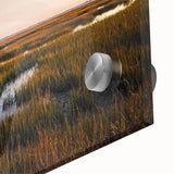 Close-up of a vibrant acrylic glass wall art piece showcasing a marsh landscape, featuring lush greens and serene water reflections, perfect for nature-themed decor.
