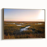 Framed canvas wall art depicting a serene marsh landscape with vibrant green foliage and a golden frame, ideal for home decor or nature-themed spaces.