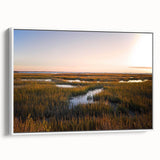Framed canvas wall art showcasing a serene marsh landscape with lush greenery and reflective water, perfect for enhancing home decor with nature's tranquility.