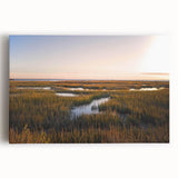 Stretched canvas wall art depicting a serene marsh landscape with vibrant greens and blues, perfect for enhancing home decor with a nature-inspired theme.