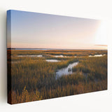 Stretched canvas wall art showcasing a serene marsh landscape with lush greenery and reflective water, ideal for nature-themed home decor. The vibrant colors enhance the tranquil ambiance, making it perfect for living spaces or offices.