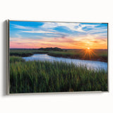 Framed canvas wall art depicting a serene marsh landscape with vibrant greens and blues, showcasing reflections in the water, ideal for nature-themed decor.