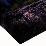 Close-up of a vibrant stretched canvas showcasing a serene marsh landscape with lush greenery and tranquil water reflections, perfect for enhancing home decor.