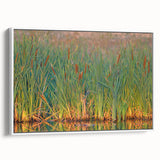 Framed canvas wall art showcasing a serene marsh landscape with lush greenery and reflections in water, perfect for nature-themed decor. The artwork emphasizes tranquility and natural beauty, ideal for home or office settings.