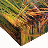 Close-up of a vibrant stretched canvas wall art piece depicting a serene marsh landscape with lush greenery and reflective water, perfect for nature-inspired decor.