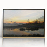Framed landscape wall art design depicting a serene marsh and swamp scene, featuring rich greens and earthy tones, accented with a sleek gold frame for an elegant touch. Perfect for nature lovers seeking to enhance their home decor with tranquil imagery.