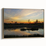 Framed canvas wall art collection showcasing a serene marsh landscape with lush greenery and golden accents, ideal for adding a touch of nature to home decor.