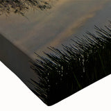 Close-up of a stretched canvas wall art featuring a serene marsh landscape with vibrant greens and blues, perfect for nature-themed home decor.