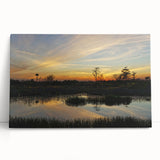 Stretched canvas artwork depicting a serene marsh landscape with vibrant greens and blues, ideal for nature enthusiasts and home decor lovers.