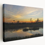 Stretched canvas artwork showcasing a serene marsh landscape with vibrant greens and earthy tones, perfect for adding a natural touch to home decor. Ideal for nature lovers and art enthusiasts seeking tranquil wall art.