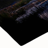 Close-up of a vibrant stretched canvas artwork depicting a serene marsh landscape, showcasing lush greenery, reflective water, and soft earth tones, ideal for nature lovers.