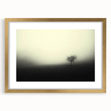Framed wall art featuring a serene misty landscape design, highlighted with a gold frame and mat, perfect for enhancing home decor aesthetics. Ideal for nature lovers and modern interiors.