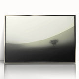 Framed acrylic wall art featuring a serene misty landscape design, showcasing soft gray and silver tones, perfect for modern home decor. Ideal for adding a calming touch to living spaces.