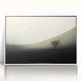 Framed wall art showcasing a misty landscape design with soft fog and serene tones, featuring a sleek white frame that enhances the tranquil aesthetic. Perfect for modern home decor and creating a calming atmosphere in any room.
